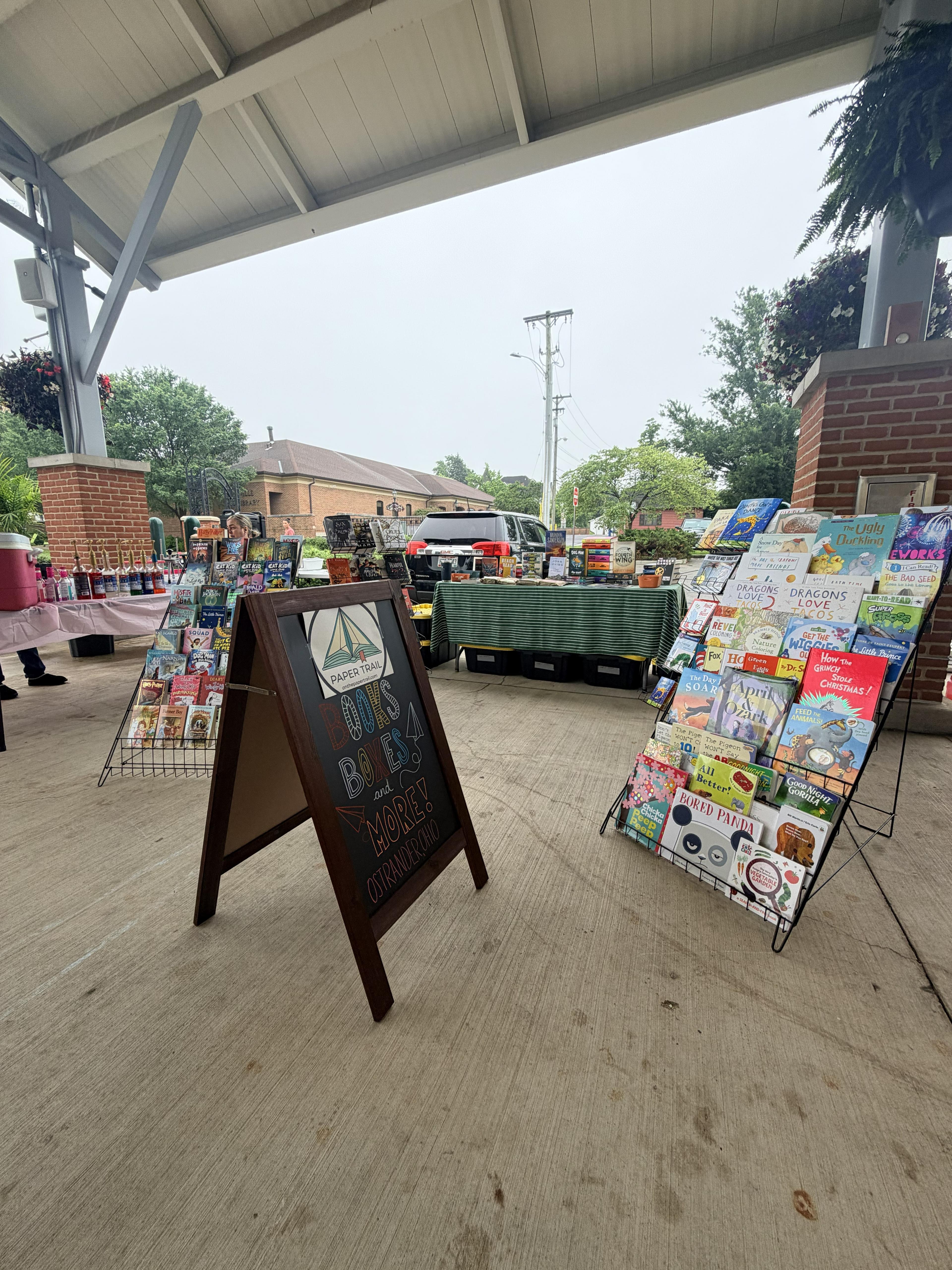 The Paper Trail mobile bookshop tent set up at a downtown pop-up